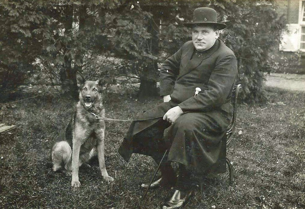 Pastor van Rooijen with dog
